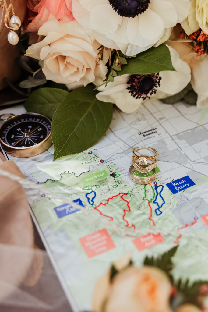 Map with rings and wedding florals 